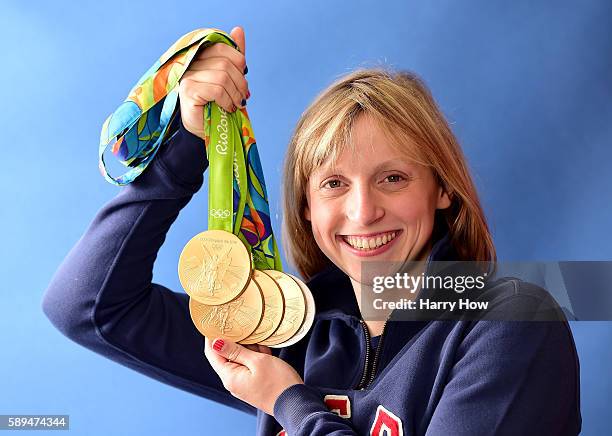 Swimmer, Katie Ledecky of the United States poses for a photo with her five medals on the Today show set on Copacabana Beach on August 13, 2016 in...