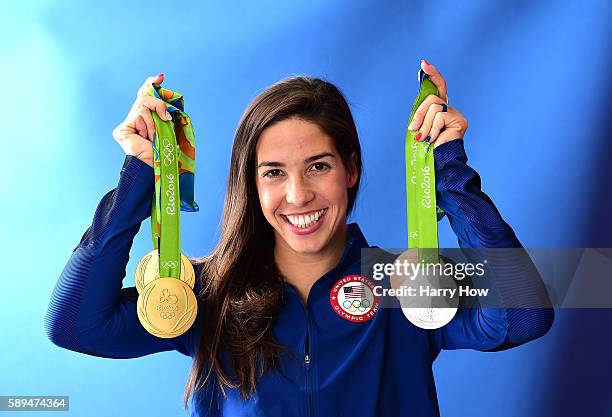 Swimmer, Maya DiRado of the United States poses for a photo with her four medals on the Today show set on Copacabana Beach on August 13, 2016 in Rio...