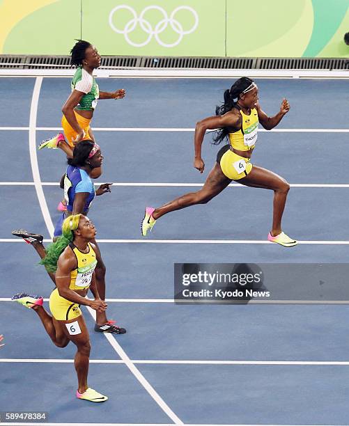 Jamaican sprinter Elaine Thompson wins the women's 100-meter final in the athletics competition of the Rio de Janeiro Olympic Games on Aug. 13, 2016.