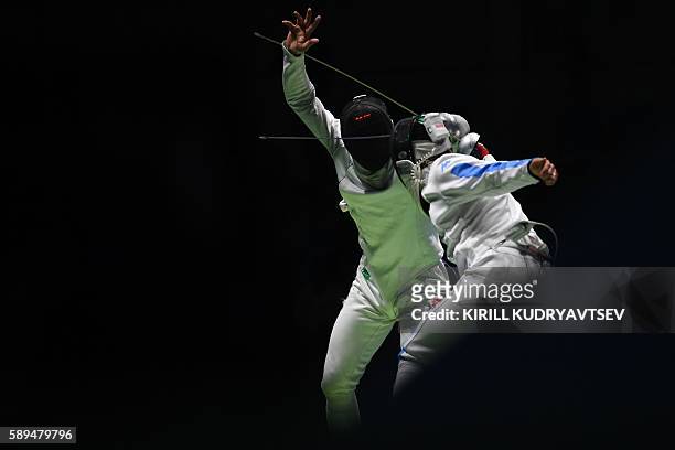 Switzerland's Benjamin Steffen competes against Italy's Paolo Pizzo during the mens team epee quarter-final bout between Italy and Switzerland as...