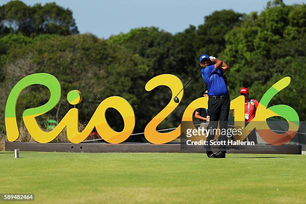 Chawrasia of India plays his shot from the 16th tee during the final round of men's golf on Day 9 of the Rio 2016 Olympic Games at the Olympic Golf...