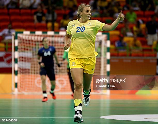 Isabelle Gullden of Sweden celebrates her goal in the first half against France on Day 9 of the Rio 2016 Olympic Games at the Future Arena on August...