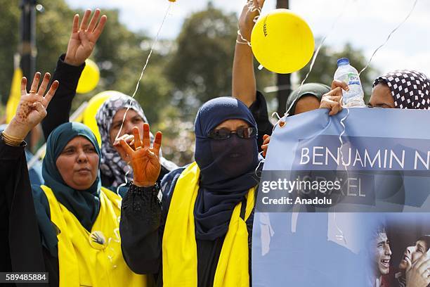 Pro-Morsi demonstrators protest on the 3rd anniversary of Egypt's 2013 Rabaa massacre at Marble Arch, London, England on August 14, 2016. In 2013...