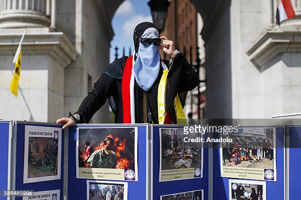 Pro-Morsi demonstrators protest on the 3rd anniversary of Egypt's 2013 Rabaa massacre at Marble Arch, London, England on August 14, 2016. In 2013...