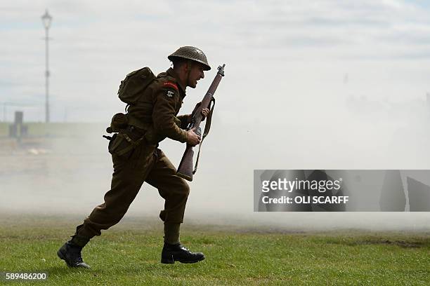 Historical reenactors take part in a World War Two battle reenactment at the 'Lytham 1940s Wartime Festival' in Lytham St Annes, north west England...
