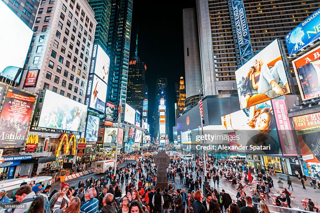 Illuminated Times Square at night, New York City, NY, United States
