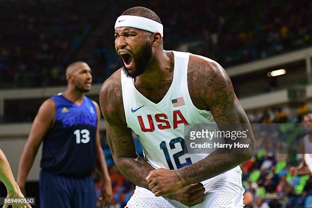 Demarcus Cousins of United States celebrates while Boris Diaw of France looks on on Day 9 of the Rio 2016 Olympic Games at Carioca Arena 1 on August...