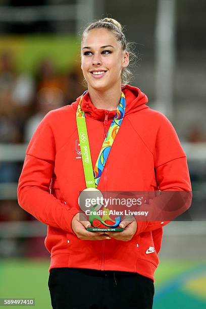 Bronze medalist Giulia Steingruber of Switzerland celebrates on the podium at the medal ceremony for Women's Vault on Day 9 of the Rio 2016 Olympic...