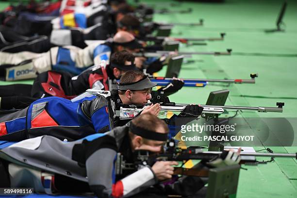 Bronze medal France's Alexis Raynaud competes during the 50m Rifle 3 positions men's finals at the Olympic Shooting Centre in Rio de Janeiro on...