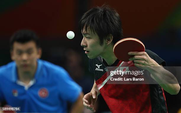 Koki Niwa of Japan serves during the Table Tennis Men's Quarterfinal Match between Japan and Hong Kong on August 14, 2016 in Rio de Janeiro, Brazil.