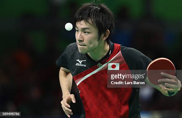 Koki Niwa of Japan serves during the Table Tennis Men's Quarterfinal Match between Japan and Hong Kong on August 14, 2016 in Rio de Janeiro, Brazil.