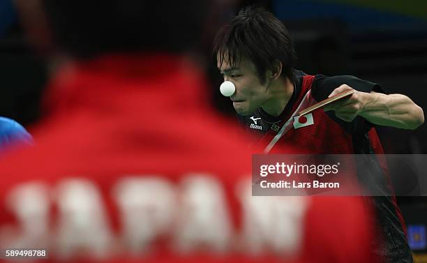 Koki Niwa of Japan serves during the Table Tennis Men's Quarterfinal Match between Japan and Hong Kong on August 14, 2016 in Rio de Janeiro, Brazil.