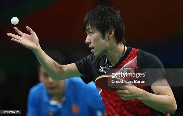 Koki Niwa of Japan serves during the Table Tennis Men's Quarterfinal Match between Japan and Hong Kong on August 14, 2016 in Rio de Janeiro, Brazil.