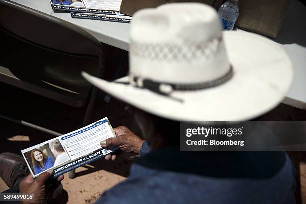 An attendee holds campaign literature during an event for Representative Ann Kirkpatrick, a Democrat from Arizona, not pictured, on the Navajo Nation...