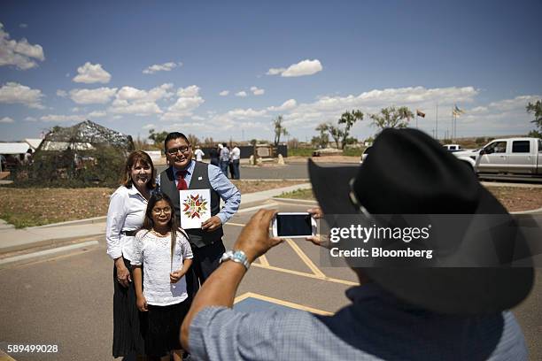 Representative Ann Kirkpatrick, a Democrat from Arizona, left, stands for a photograph with attendees during a campaign event on the Navajo Nation...