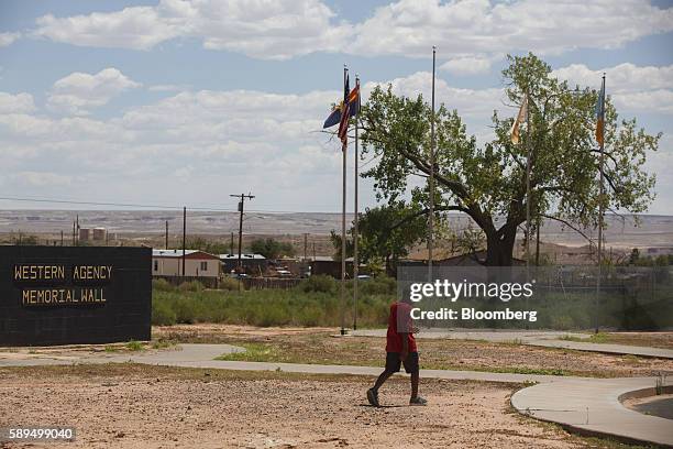 Child walks through a park during a campaign event for Representative Ann Kirkpatrick, a Democrat from Arizona, not pictured, on the Navajo Nation...