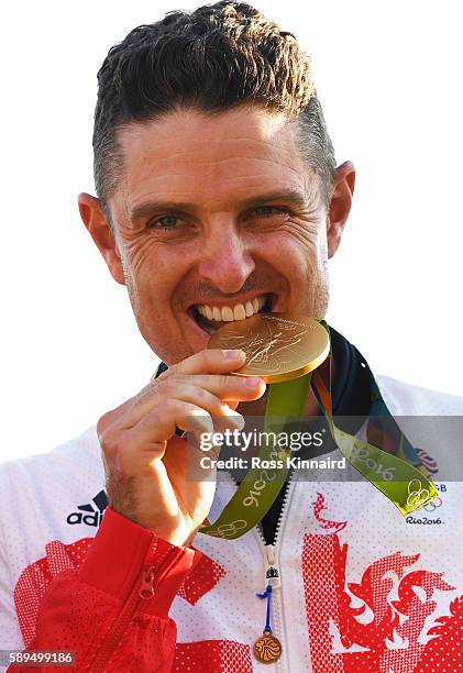 Justin Rose of Great Britain celebrates with the gold medal after winning in the final round of men's golf on Day 9 of the Rio 2016 Olympic Games at...