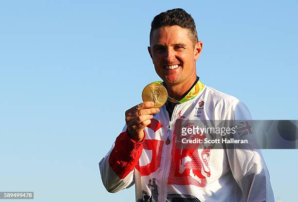 Justin Rose of Great Britain celebrates with the gold medal after winning in the final round of men's golf on Day 9 of the Rio 2016 Olympic Games at...