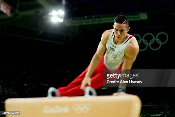 Alexander Naddour of the United States competes in the Men's Pommel Horse Final on Day 9 of the Rio 2016 Olympic Games at the Rio Olympic Arena on...