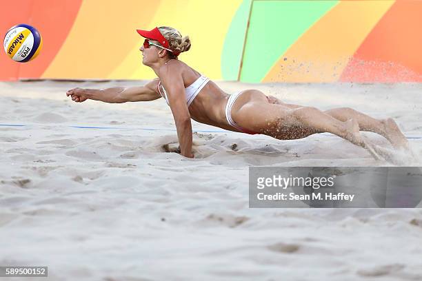 Heather Bansley of Canada dives for the ball during a Women's Quarterfinal match between Canada and Germany on Day 9 of the Rio 2016 Olympic Games at...