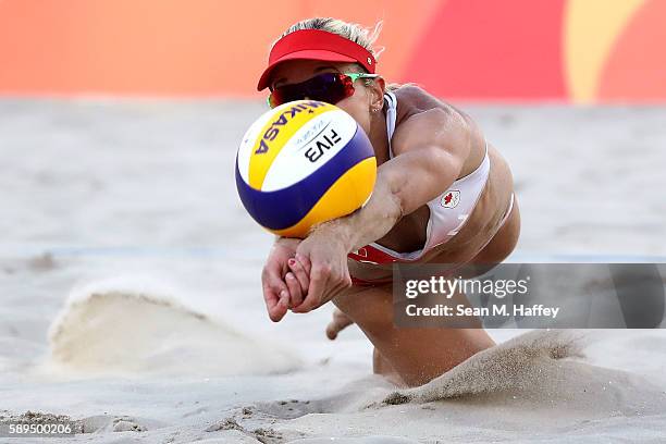 Heather Bansley of Canada dives for a ball during a Women's Quarterfinal match between Canada and Germany on Day 9 of the Rio 2016 Olympic Games at...