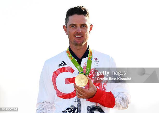 Justin Rose of Great Britain celebrates with the gold medal after winning in the final round of men's golf on Day 9 of the Rio 2016 Olympic Games at...