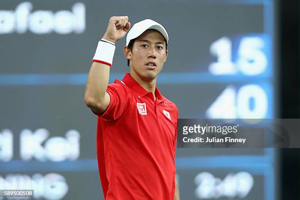 Kei Nishikori of Japan celebrates match point to win the singles bronze medal match against Rafael Nadal of Spain on Day 9 of the Rio 2016 Olympic...