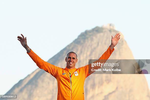 Dorian van Rijsselberghe of the Netherlands celebrates winning gold medal in the Men's RS:X class on Day 9 of the Rio 2016 Olympic Games at the...