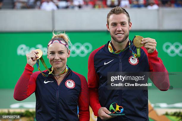 Gold medalists Jack Sock and Bethanie Mattek-Sands of the United States pose on the podium during the ceremony for the mixed doubles on Day 9 of the...