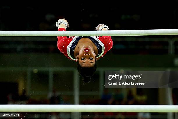 Gabrielle Douglas of the United States competes in the Women's Uneven Bars Final on Day 9 of the Rio 2016 Olympic Games at the Rio Olympic Arena on...