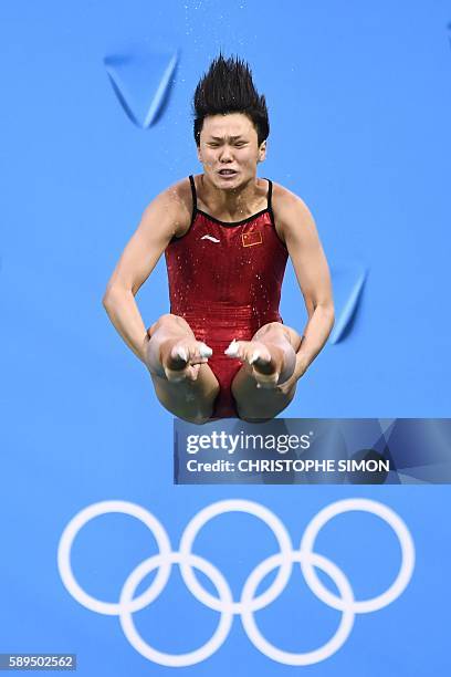 China's Shi Tingmao competes in the Women's 3m Springboard Final during the diving event at the Rio 2016 Olympic Games at the Maria Lenk Aquatics...