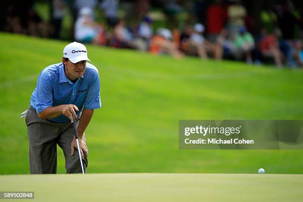 Johnson Wagner lines up a putt on the eighth green during the final round of the John Deere Classic at TPC Deere Run on August 14, 2016 in Silvis,...