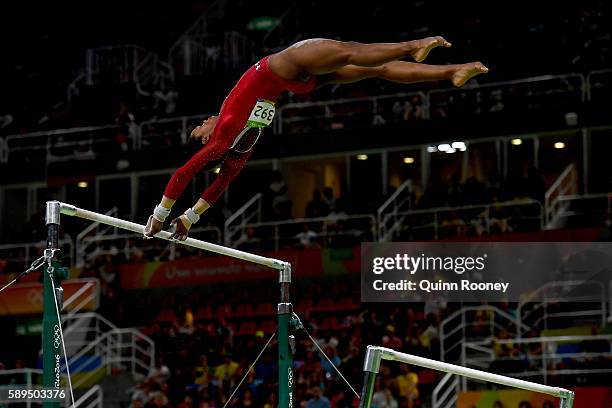 Gabrielle Douglas of the United States competes in the Women's Uneven Bars Final on Day 9 of the Rio 2016 Olympic Games at the Rio Olympic Arena on...