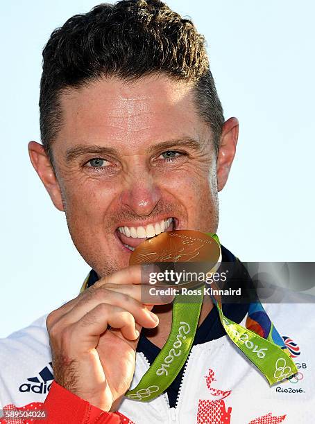 Justin Rose of Great Britain celebrates with the gold medal after winning in the final round of men's golf on Day 9 of the Rio 2016 Olympic Games at...