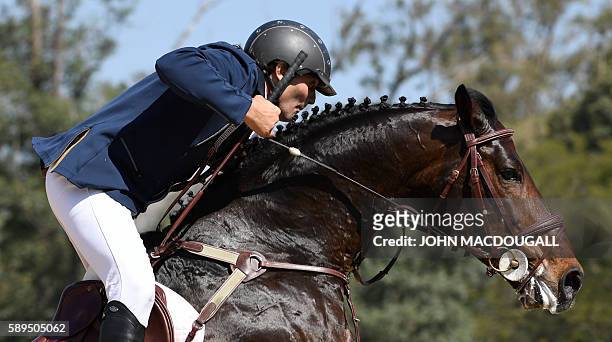 Uruguay's Nestor Nielsen van Hoff on Prince Royal Z de la Luz competes during the Equestrian's Show Jumping first qualifier event of the 2016 Rio...