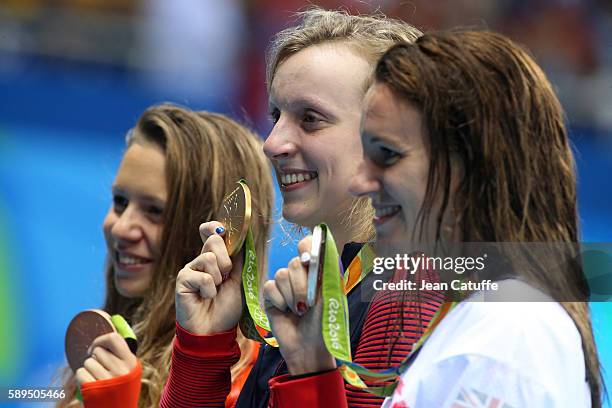 Bronze medalist Boglarka Kapas of Hungary, gold medalist Katie Ledecky of USA and silver medalist Jazz Carlin of Great Britain pose during the medal...