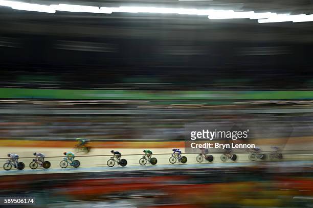 Cyclists compete during the Men's Omnium Scratch Race 1/6 on Day 9 of the Rio 2016 Olympic Games at the Rio Olympic Velodrome on August 14, 2016 in...