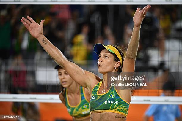 Brazil's Larissa Franca Maestrini reacts during the women's beach volleyball quarter-final match between Brazil and Switzerland at the Beach Volley...