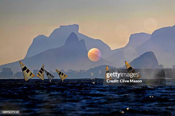 The Finn Class fleet in action during their second race of the day on Day 9 of the Rio 2016 Olympic Games at the Marina da Gloria on August 14, 2016...