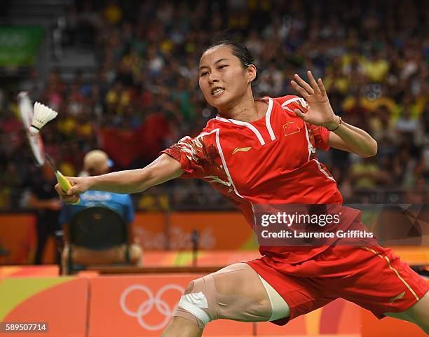 Yihan Wang of China in action during her Badminton Womens Singles match against Karin Schnaase of Germany on Day 9 of the Rio 2016 Olympic Games at...