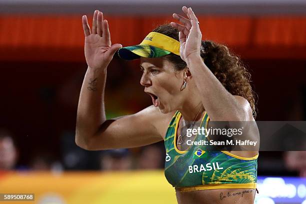 Larissa Franca Maestrini of Brazil celebrates after defeating Switzerland in a Women's Quarterfinal match on Day 9 of the Rio 2016 Olympic Games at...