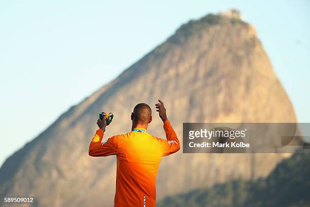 Dorian van Rijsselberghe of the Netherlands celebrates winning the gold medal in the Men's RS:X class on Day 9 of the Rio 2016 Olympic Games at the...