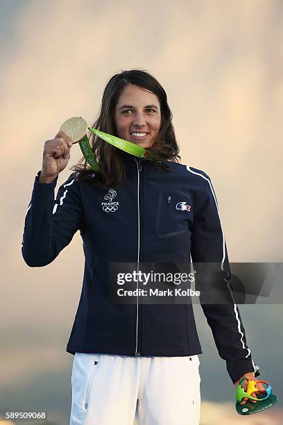 Charline Picon of France celebrates after winning the gold medal in the Women's RS:X class on Day 9 of the Rio 2016 Olympic Games at the Marina da...