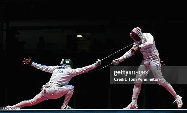 Paolo Pizzo of Italy competes against Yannick Borel of France during the Men's Epee Team Gold Medal Match on Day 9 of the Rio 2016 Olympic Games at...