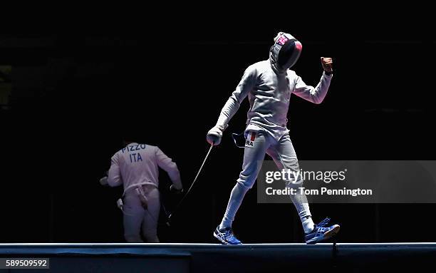 Daniel Jerent of France react against Paolo Pizzo of Italy during the Men's Epee Team Gold Medal Match on Day 9 of the Rio 2016 Olympic Games at the...