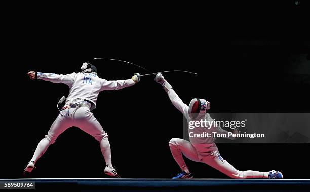 Paolo Pizzo of Italy competes against Daniel Jerent of France during the Men's Epee Team Gold Medal Match on Day 9 of the Rio 2016 Olympic Games at...