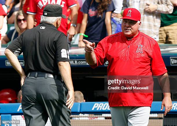 Manager Mike Scioscia of the Los Angeles Angels of Anaheim challenges a call by second base umpire Larry Vanover during the fifth inning at...