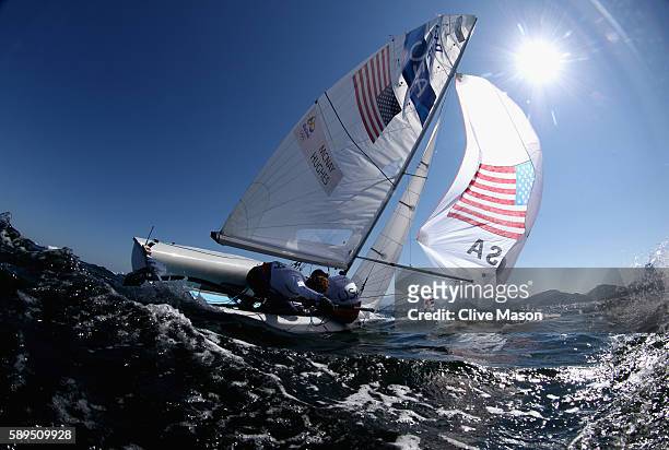 Dave Hughes and Stuart McNay of USA in action before their 470 class race on Day 9 of the Rio 2016 Olympic Games at the Marina da Gloria on August...