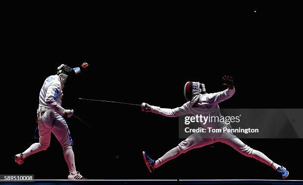 Paolo Pizzo of Italy competes against Daniel Jerent of France during the Men's Epee Team Gold Medal Match on Day 9 of the Rio 2016 Olympic Games at...