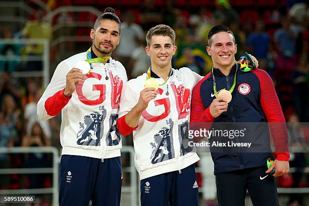 Silver medalist Louis Smith of Great Britain, gold medalist Max Whitlock of Great Britain, bronze medalist Alexander Naddour of the United States...